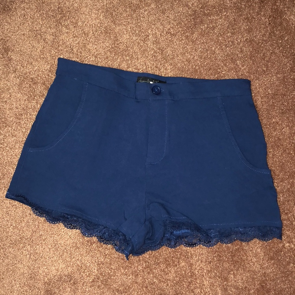 Blue shorts- never worn. Has lace on bottom